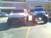 My H3 by a Big Suzuki.jpg